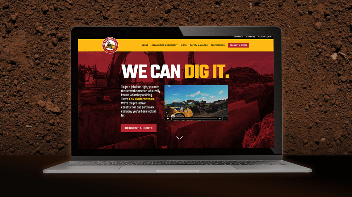 Fox Contractors website on a laptop