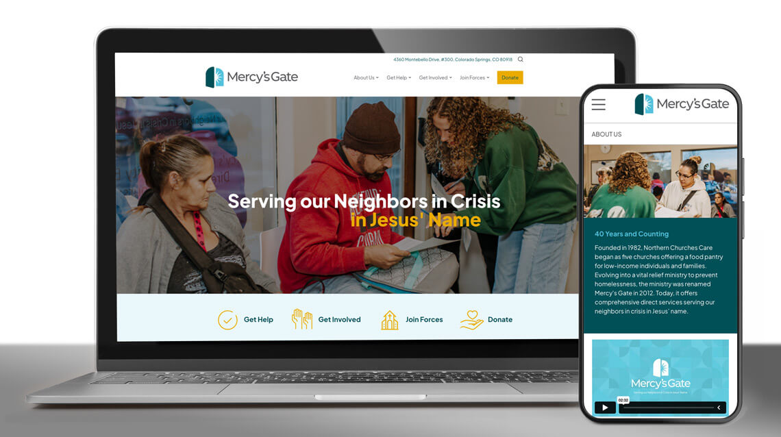 Mercy's Gate website on a laptop